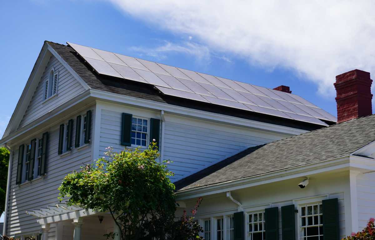 Solar panels on the roof of a traditional Colonial style house in arlington virginia