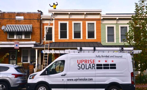 Uprise Solar installers on a flat roof in Washington, D.C. sm