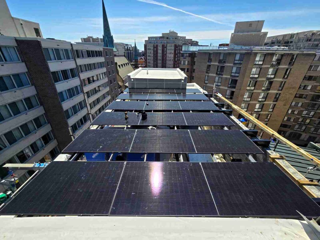 Solar panels on a flat rooftop in Washington, DC.