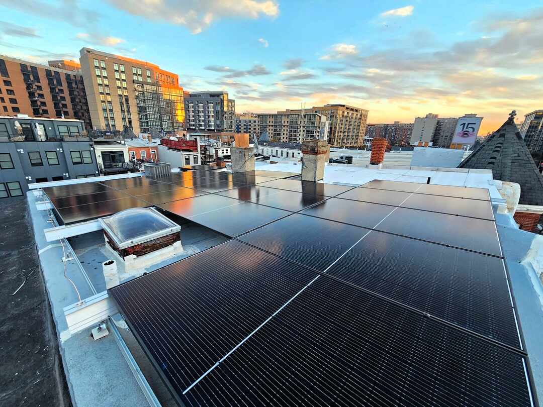 Solar panels with a city background.