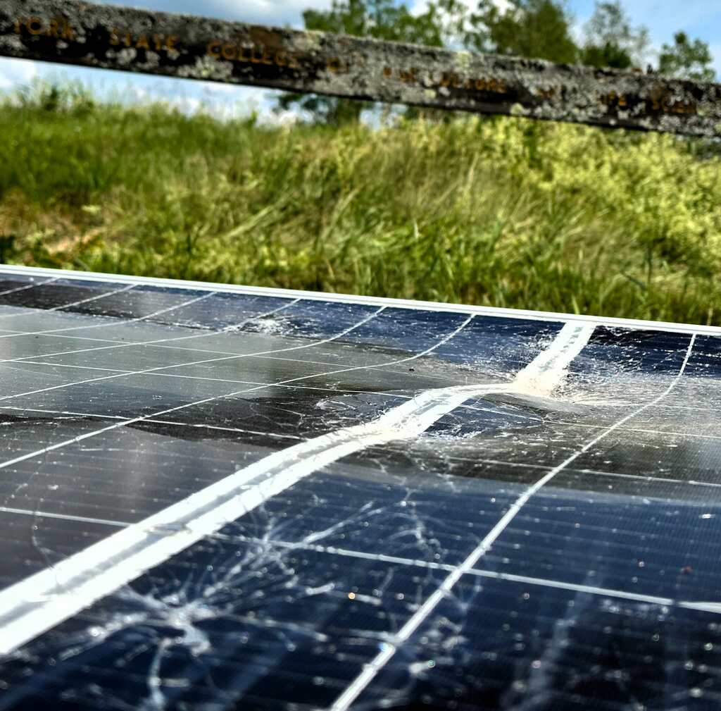 Damaged blue solar panels.
