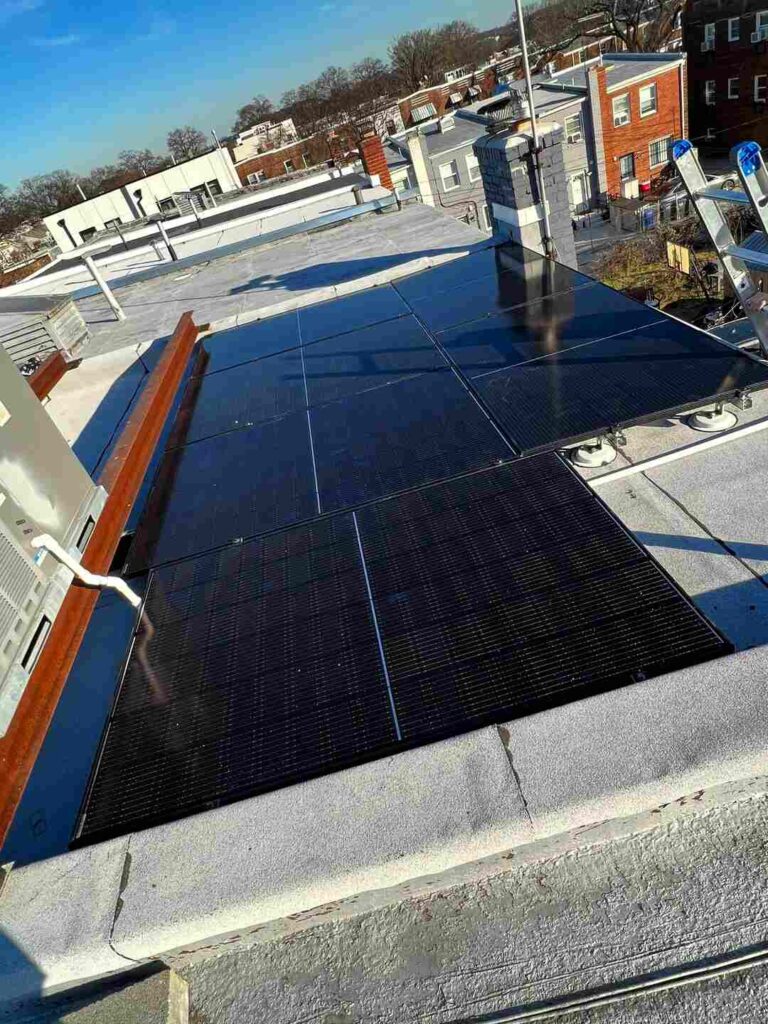 Blue solar panels on a flat roof in Northeast DC.