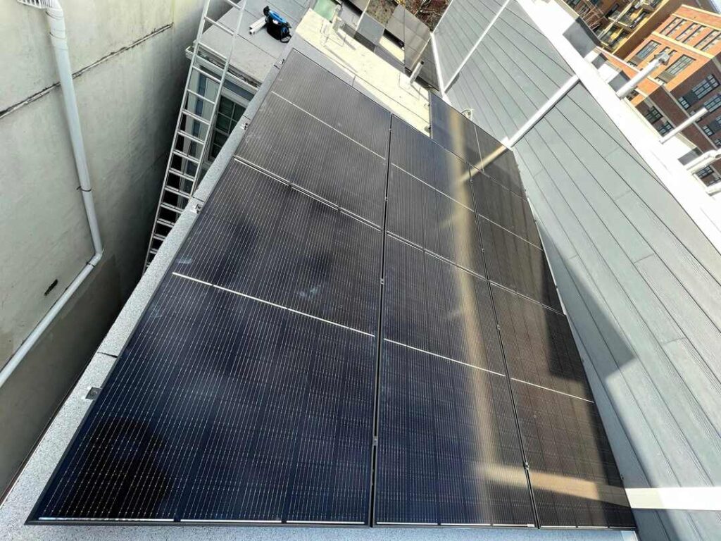 Solar panels on a flat roof.