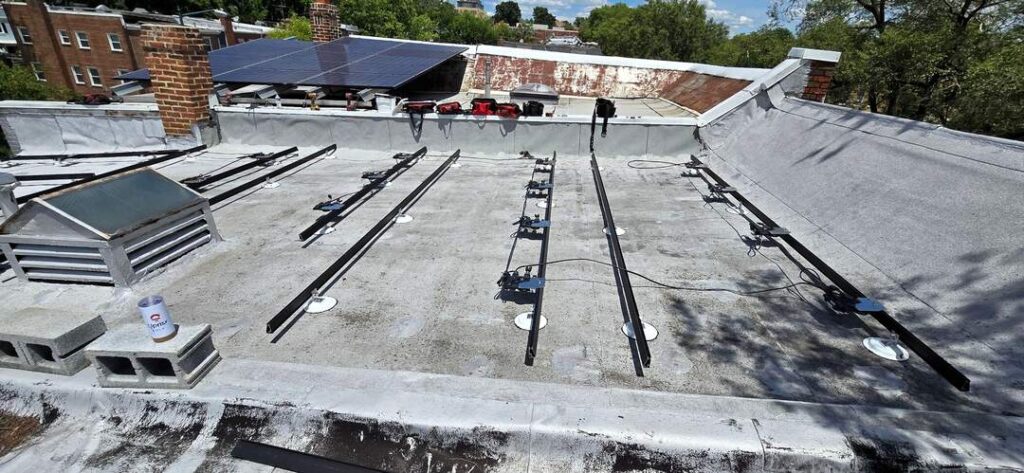 Microinverters on a flat roof.