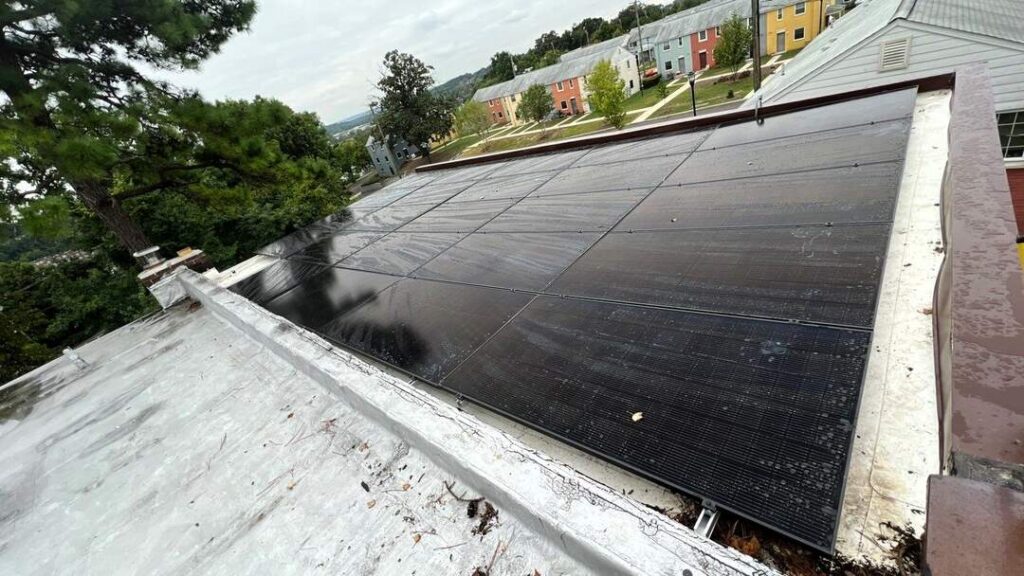 Solar panels on a flat roof.