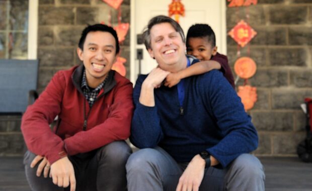 Uprise founder Chris with husband Ramon and son Calvin.