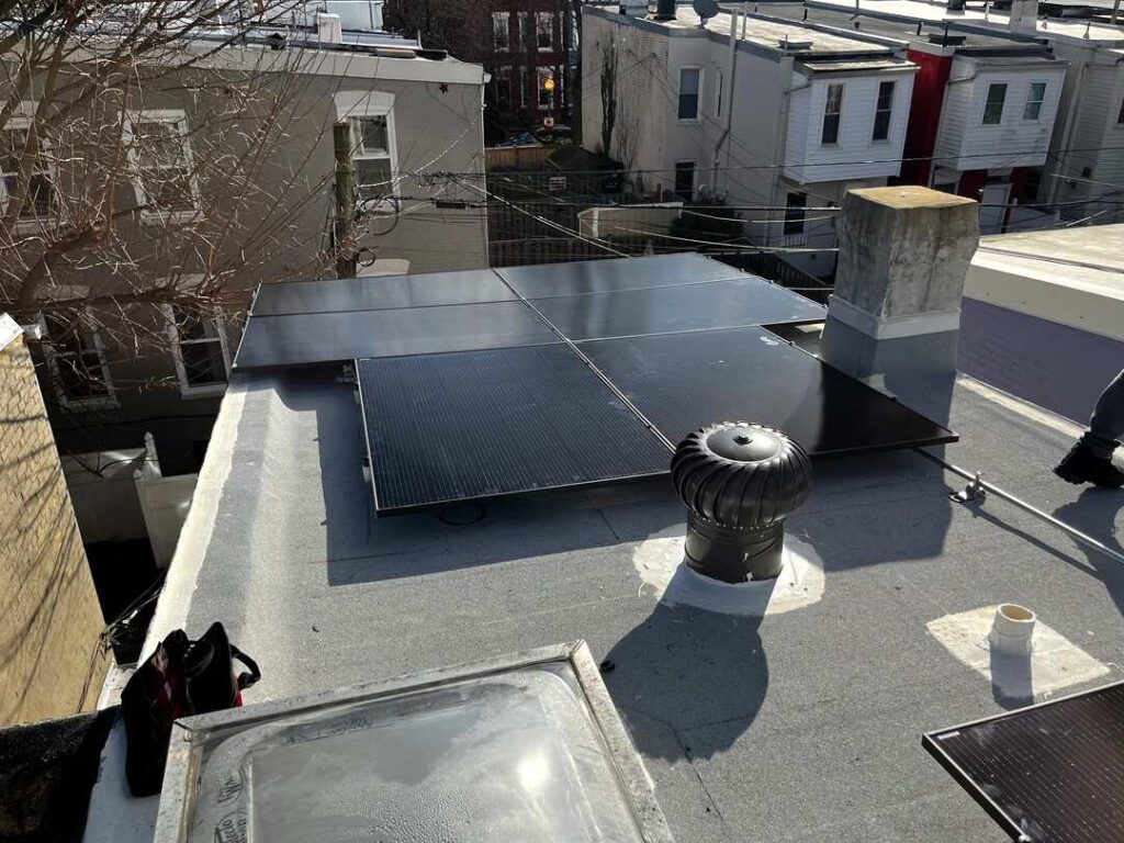 Solar panels on a flat roof in Northeast DC.