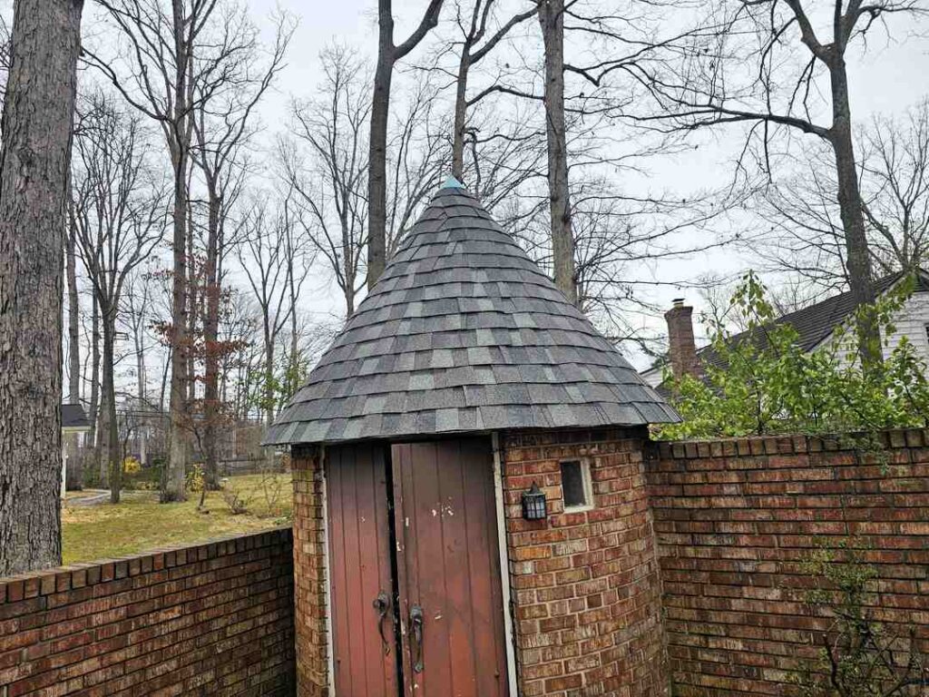 A redone shed with architectural shingles.