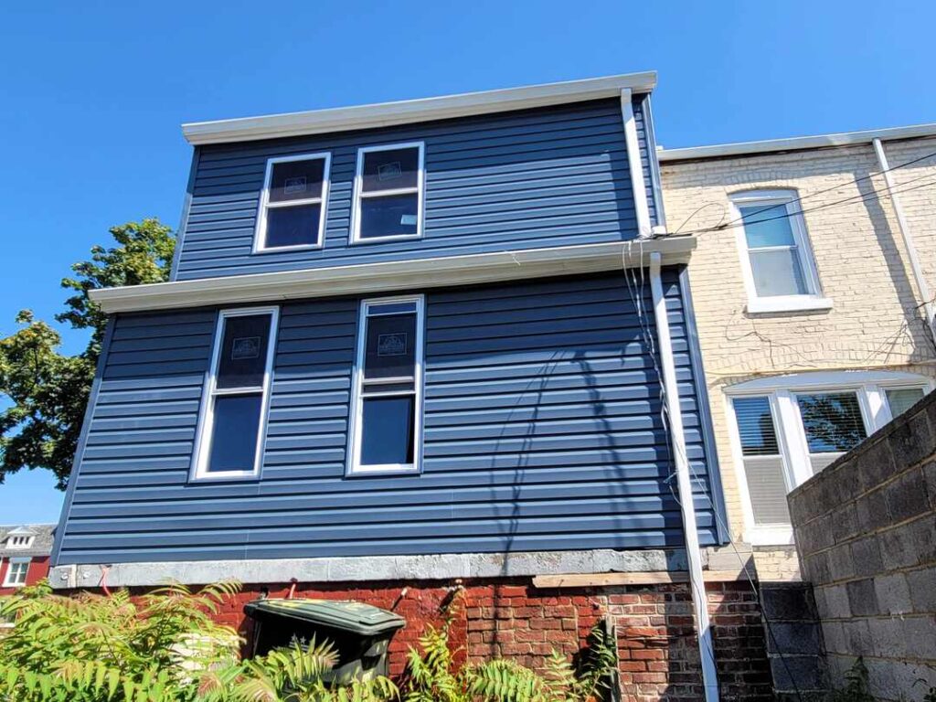 Blue siding on a two story home in DC.