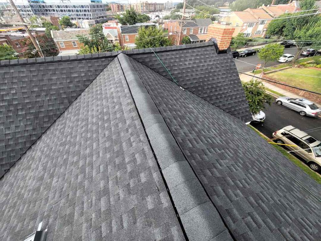 A steep roof with new architectural shingles.