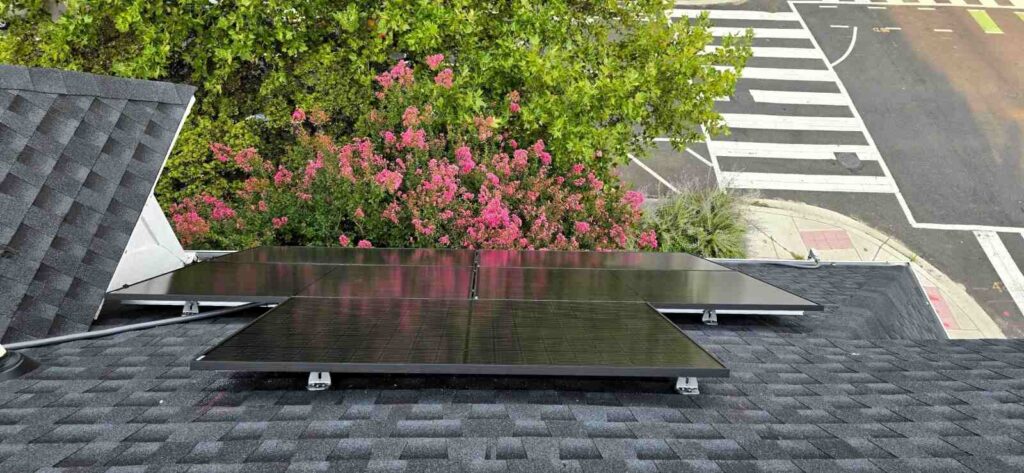 Solar panels on a shingle roof.