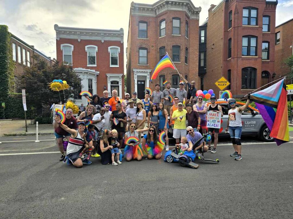 The Uprise Solar team celebrates at DC's Pride Parade.